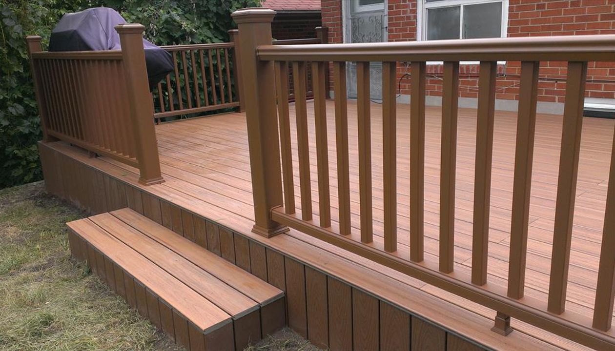 Transcend Tree House custom made COMPOSITE deck with Trex railing and skirting. The deck built in Toronto, Mississauga, Scarborough, Etobicoke, North York, Markham, Richmond Hill, Thornhill, Vaughan, Richmond Hill, Thornhill, Vaughan