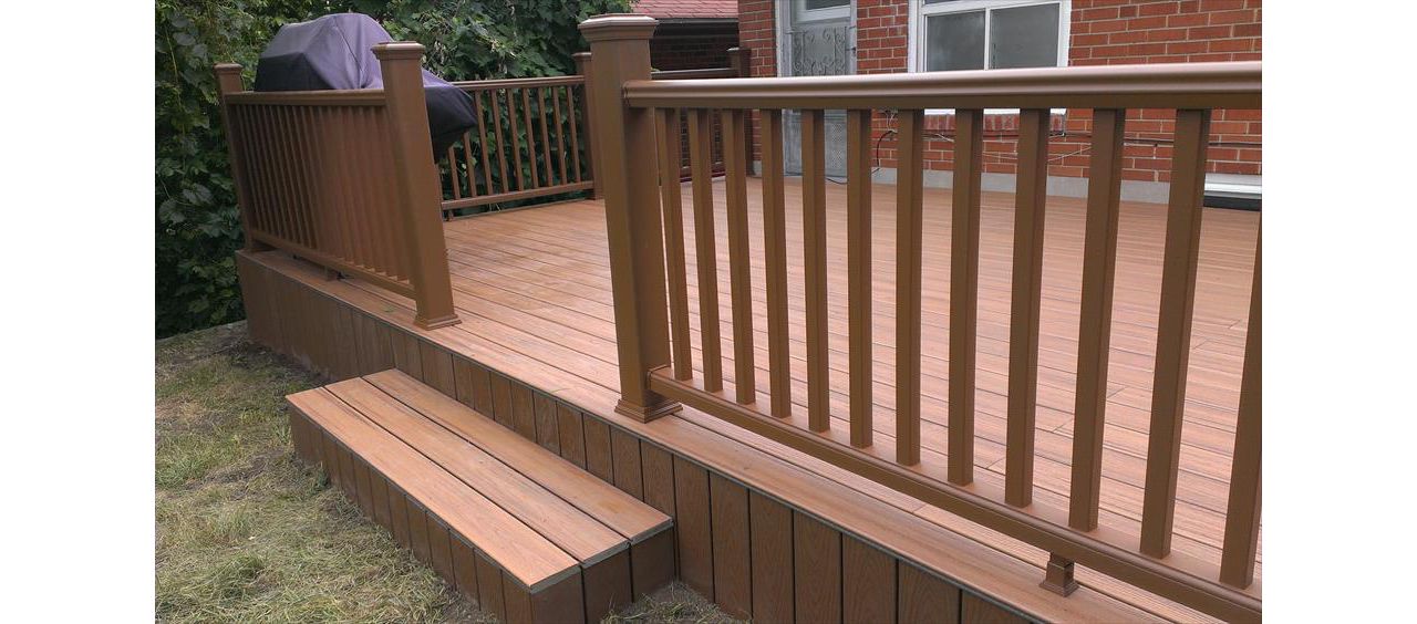 Transcend Tree House custom made COMPOSITE deck with Trex railing and skirting. The deck built in Toronto, Mississauga, Scarborough, Etobicoke, North York, Markham, Richmond Hill, Thornhill, Vaughan, Richmond Hill, Thornhill, Vaughan