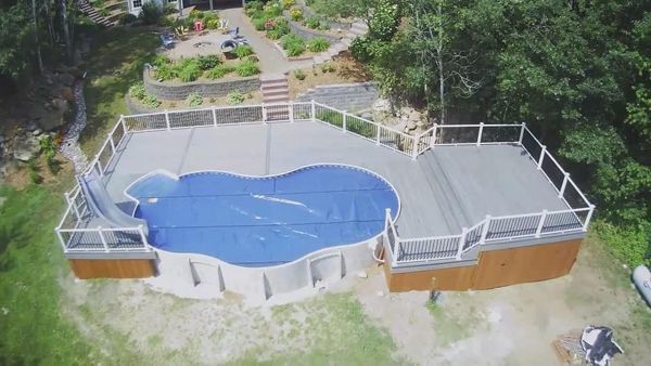 Trex Composite Decking around a pool in Eau Claire, WI area built by RBM Construction