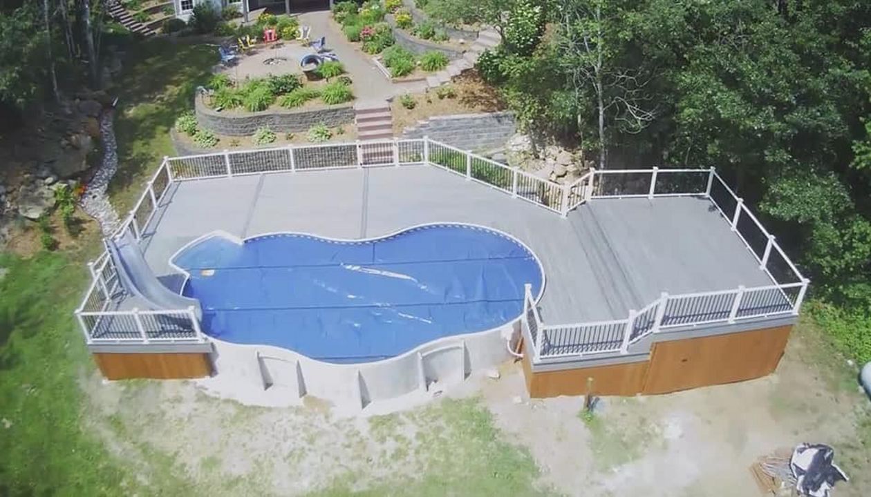 Trex Composite Decking around a pool in Eau Claire, WI area built by RBM Construction