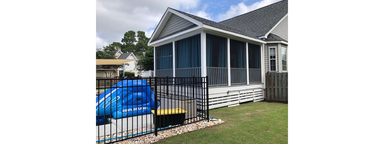 Trex Enhance Naturals Rocky Harbor deck & porch looks great with white trim