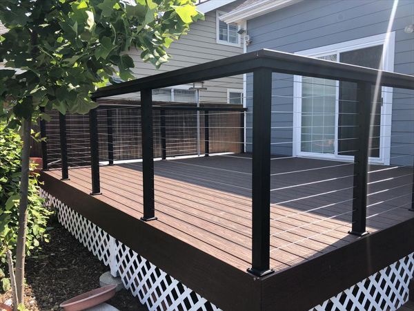 Tiki Torch Trex Transcend with stainless steel cable railing Trex cocktail rail Arroyo Grande