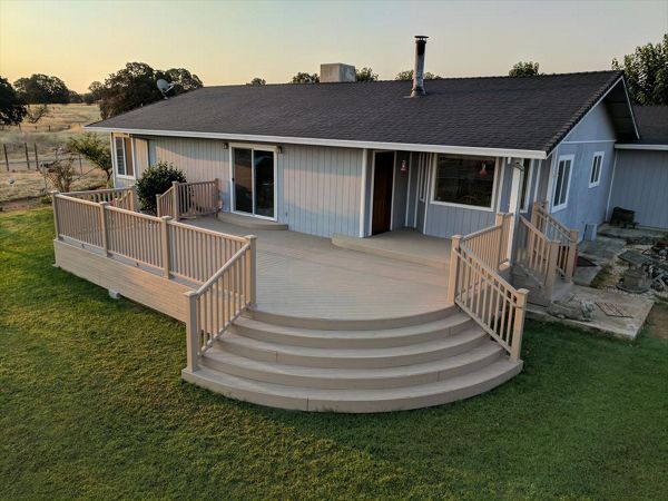 Custom Trex Rope Swing curved deck in Redding CA with Trex Transcend railing and multiple stairways. Majestic Builders is proud to provide top quality composite decks that will last a lifetime.