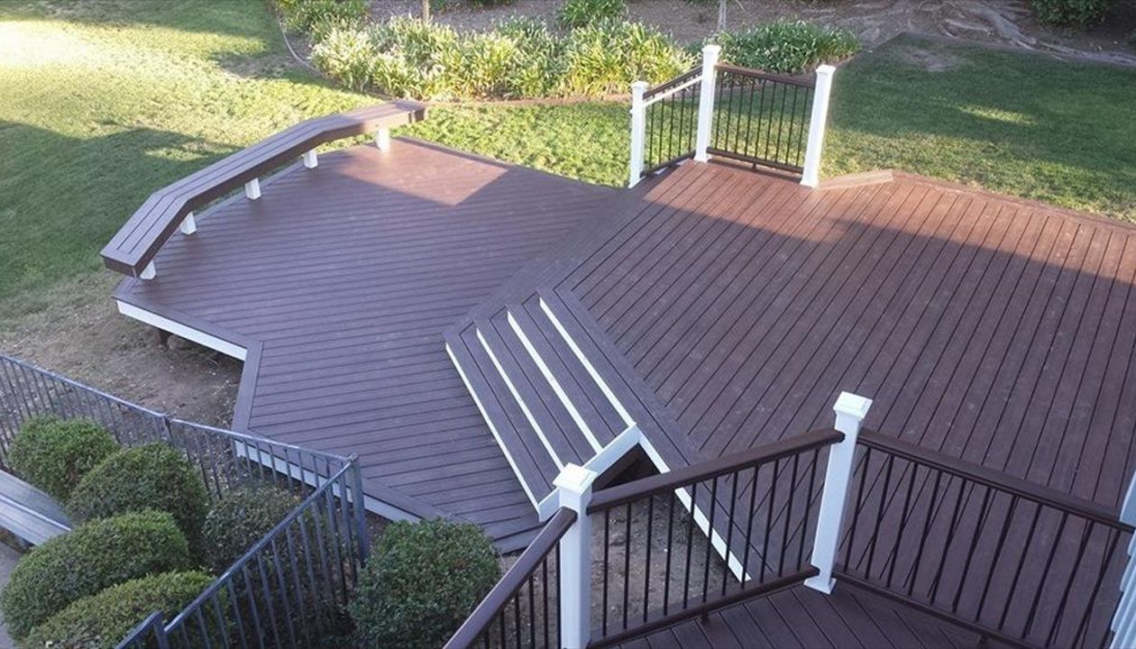Custom Lava Rock Trex deck with Transcend Railing.
