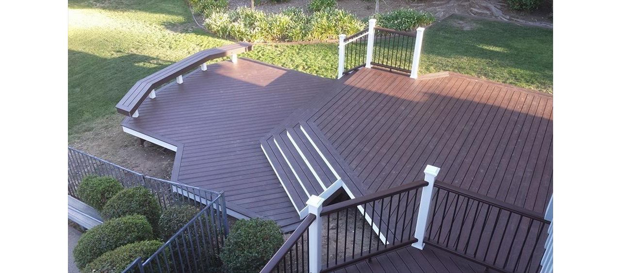 Custom Lava Rock Trex deck with Transcend Railing.