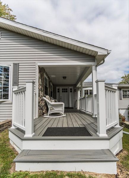 Front porch with custom front walk out.