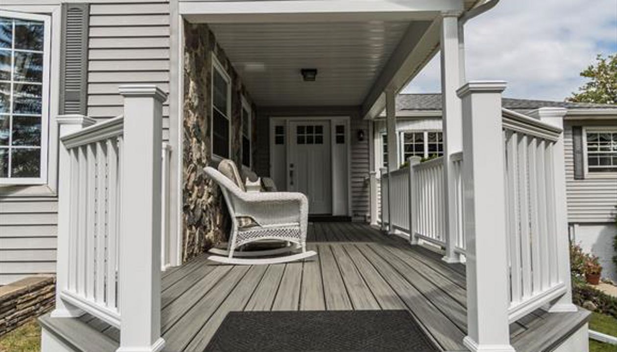 Front porch with custom front walk out.