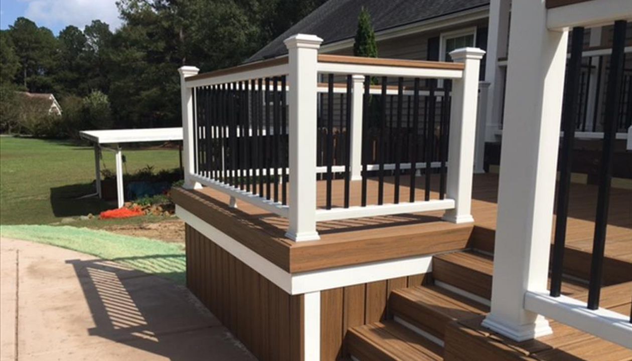 Trex Transcend Havana Gold fascia board finishes off these stairs to the pool area perfectly.