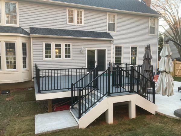 Trex Transcends Island Mist decking with Trex Signature Charcoal Black Railing
