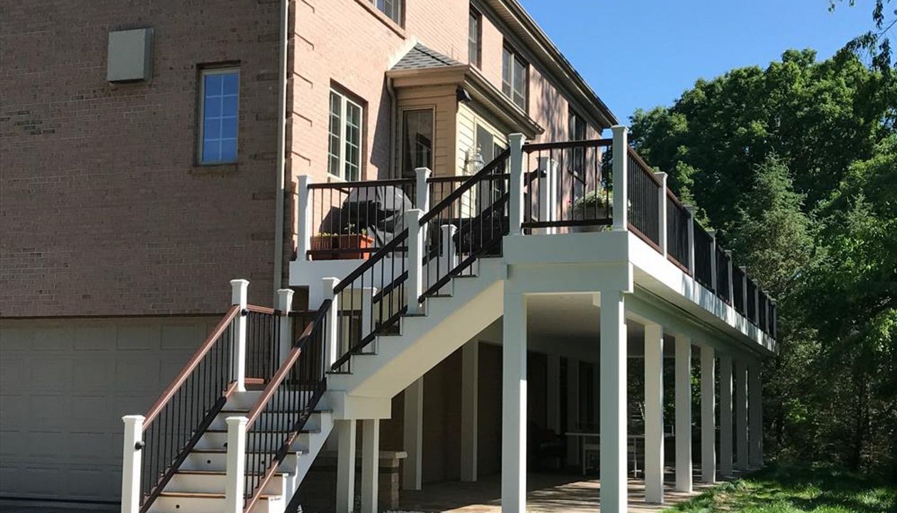 HUGE Havana Gold deck with full post and beam wrap, Trex Lighting, and Trex Rain Escape system in Fox Chapel PA