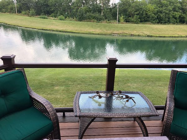 Frankfort, IL Trex Tiki Torch Decking, Spiced Rum Picture Frame Border, andVintage Lantern Transcend Glass Railing