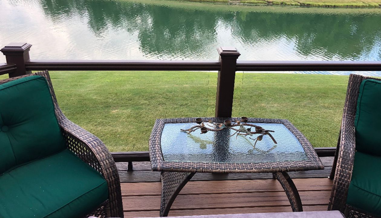 Frankfort, IL Trex Tiki Torch Decking, Spiced Rum Picture Frame Border, andVintage Lantern Transcend Glass Railing