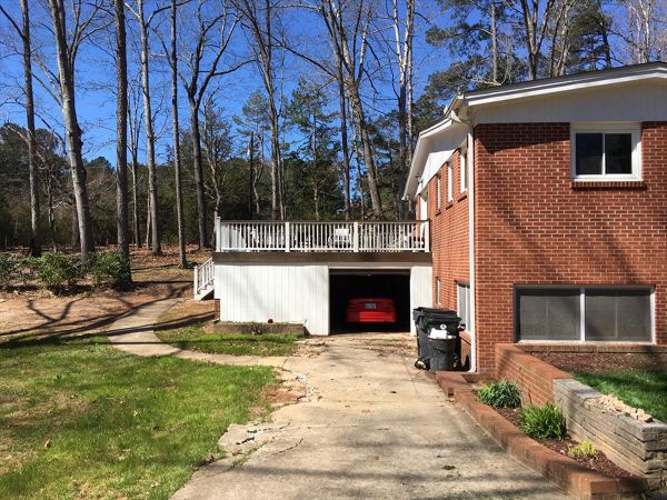 This Trex Transcend deck features Trex RainEscape drainage system to keep the garage underneath dry and clean