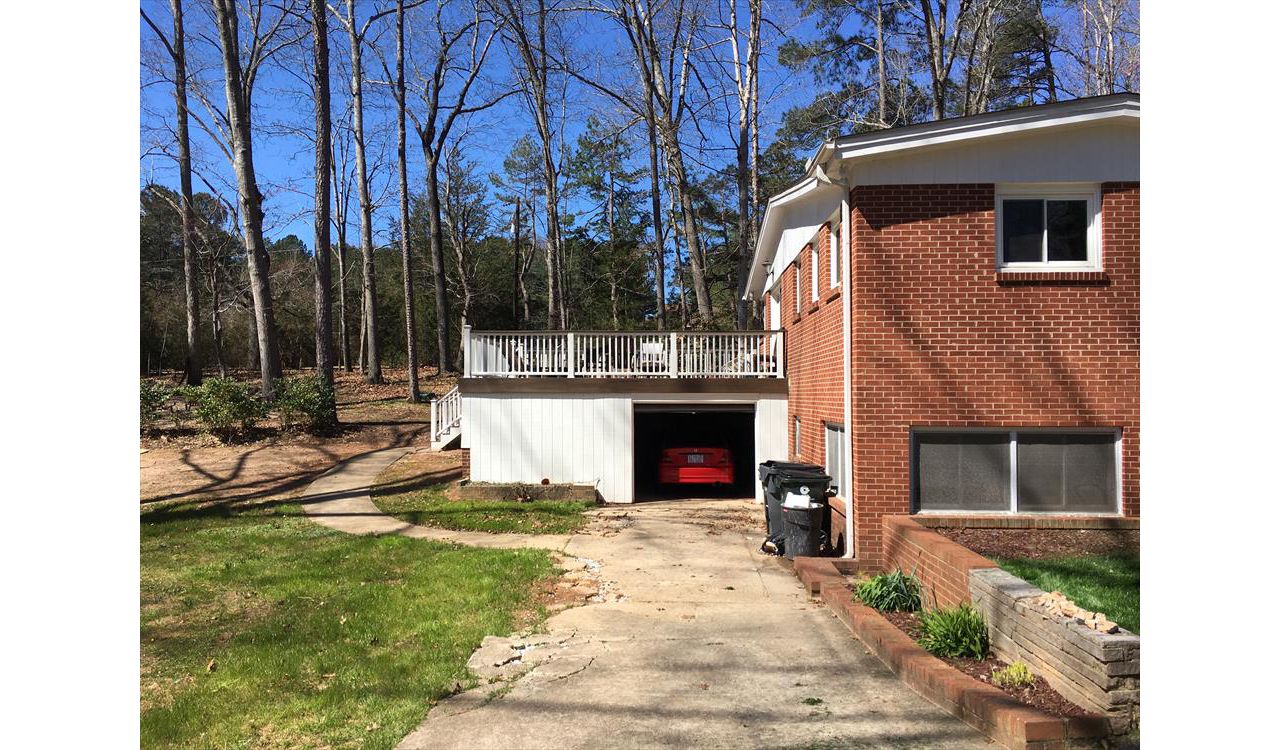 This Trex Transcend deck features Trex RainEscape drainage system to keep the garage underneath dry and clean
