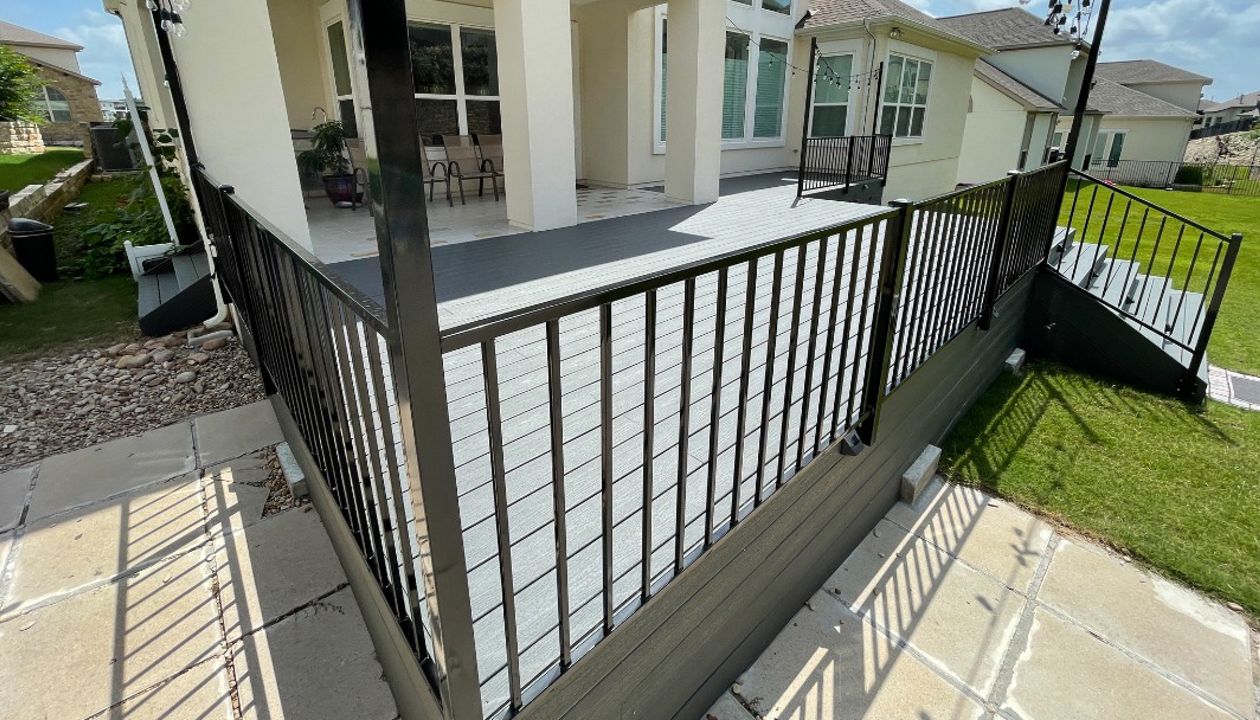 Trex Clamshell with Skirting Ornamental Iron Railing