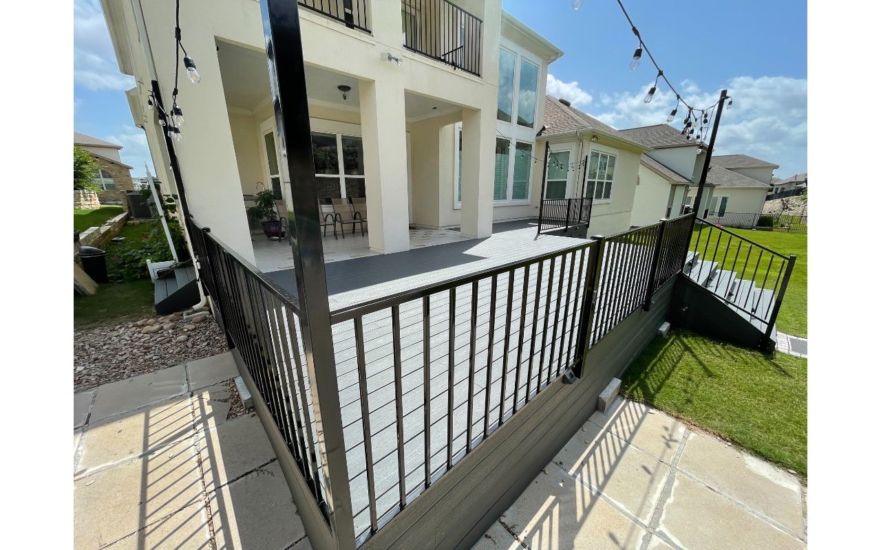 Trex Clamshell with Skirting Ornamental Iron Railing