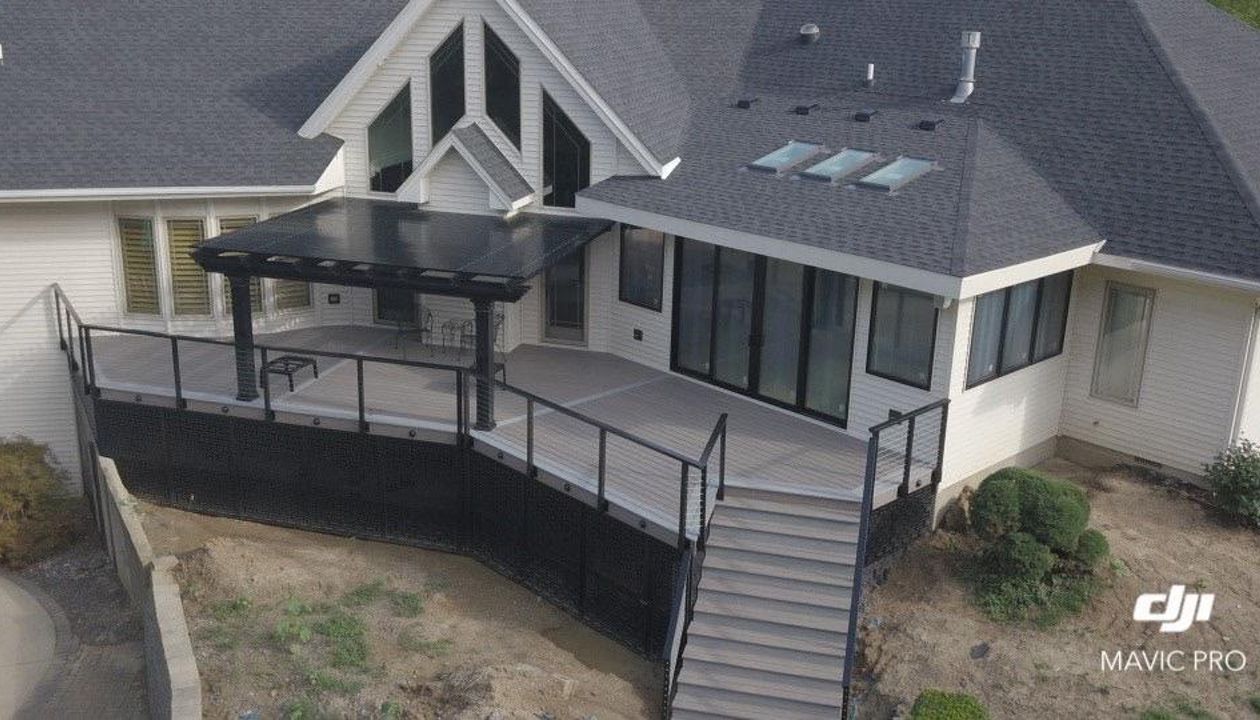 Trex Deck with cable railing and aluminum Pergola in Urbana IL.