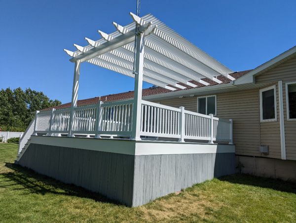 foggy wharf decking and skirting, white vinyl railing and pergola