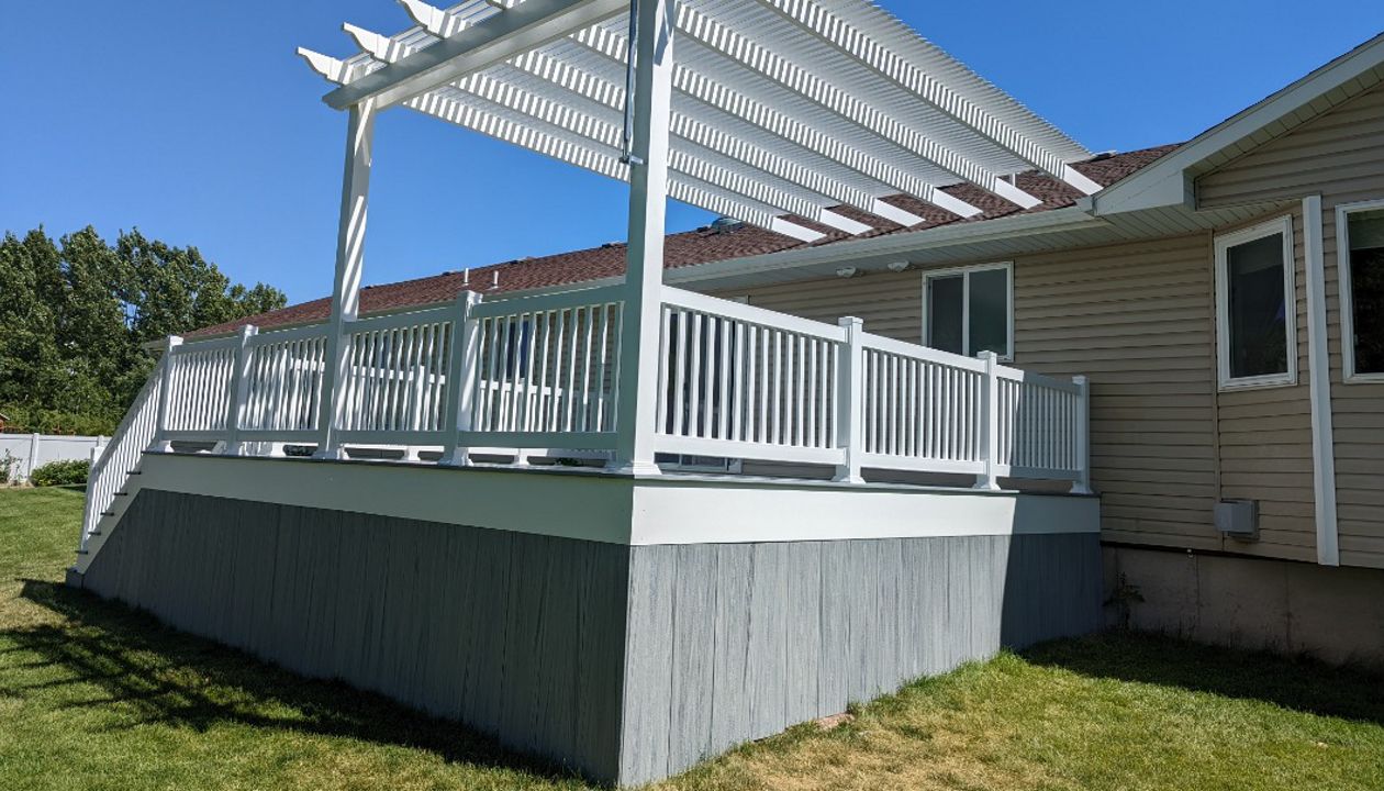 foggy wharf decking and skirting, white vinyl railing and pergola