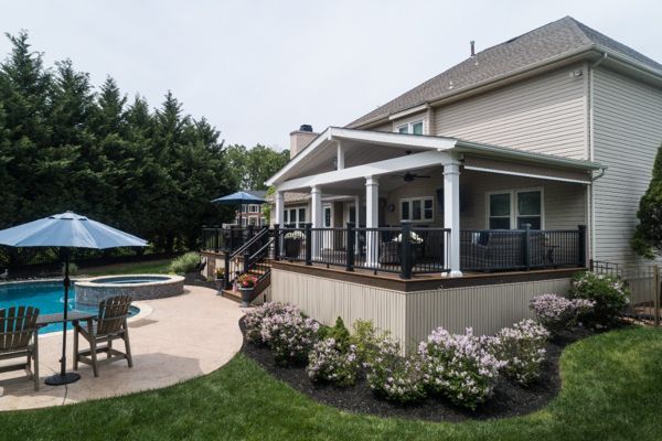 Trex Deck with Tiki Torch Decking, Transcend Railing, and Custom A-Frame Roof