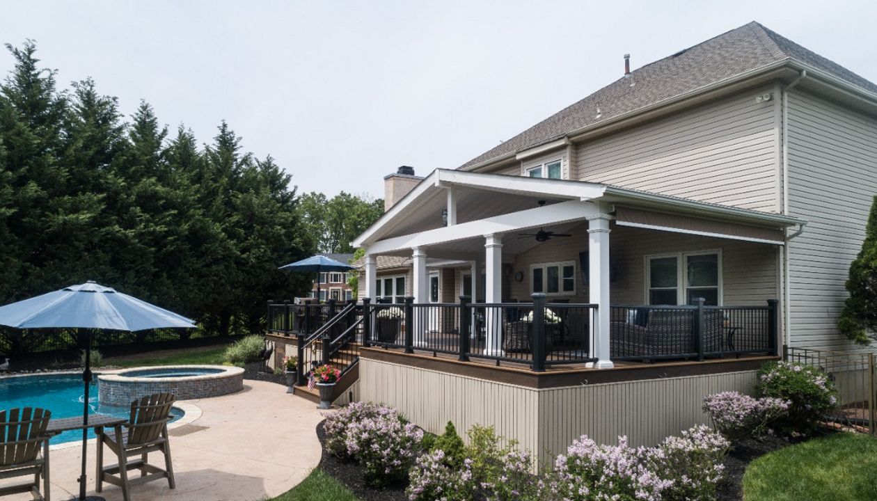 Trex Deck with Tiki Torch Decking, Transcend Railing, and Custom A-Frame Roof