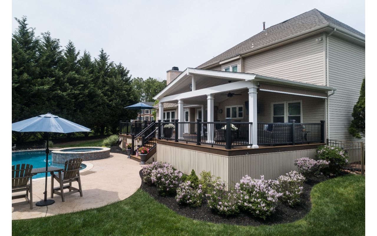 Trex Deck with Tiki Torch Decking, Transcend Railing, and Custom A-Frame Roof
