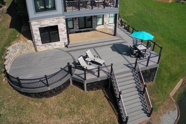 Beautiful and Massive Custom Curved Deck on the Lake in Monticello.