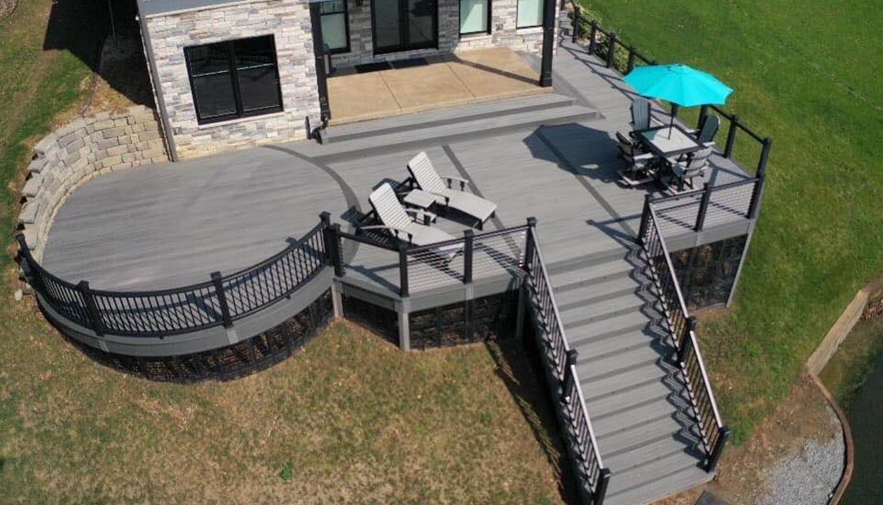 Beautiful and Massive Custom Curved Deck on the Lake in Monticello.