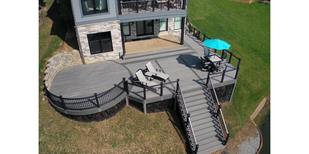 Beautiful and Massive Custom Curved Deck on the Lake in Monticello.