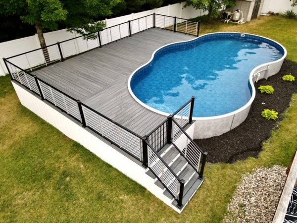 WOW! Who wouldn't want to join this family on their @Trexcompany outdoor space.... Trex Transcend Island Mist decking and Transcend white fascia, Trex Signature Rod Rail with LED cap lights and stair riser lights.