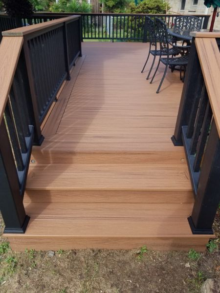 Westmoreland Deck: Tiki Torch decking, Charcoal black rails with Tiki Torch cocktail rail