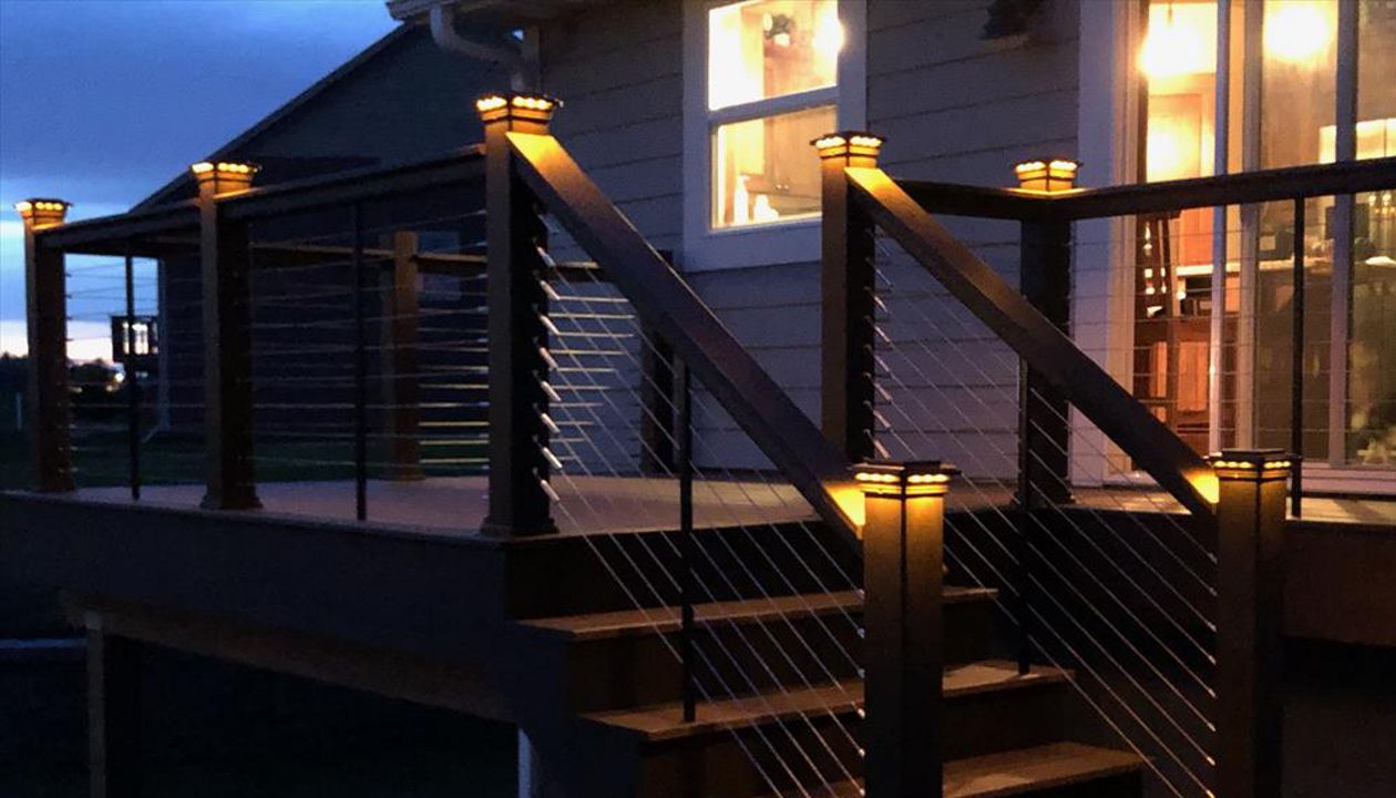 Trex Transcend Tropics Tiki Torch deck boards with Transcend Vintage Lantern Rails, fascia serving the Twin Cites, Post cap lights, deck lighting, picture frame, drink rail, hidden fasteners, Hastings, Woodbury, Egan, Edina, Minneapolis, Lake of the Isles