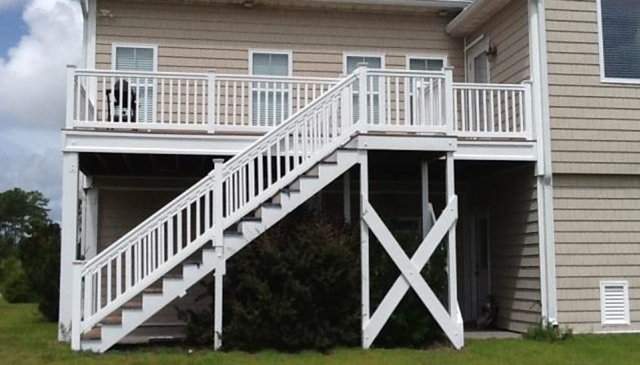 Back deck area looks great with white rails