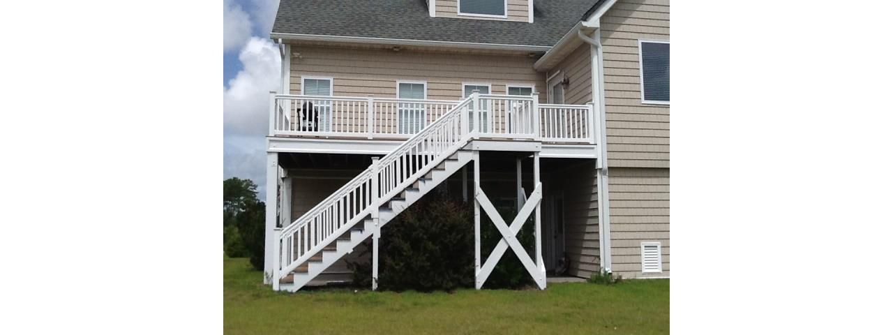 Back deck area looks great with white rails