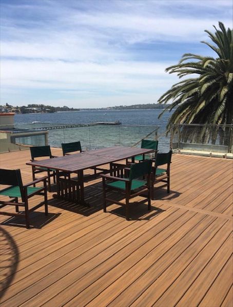 Above a water free garage using Trex Rain Escape and Havana Gold