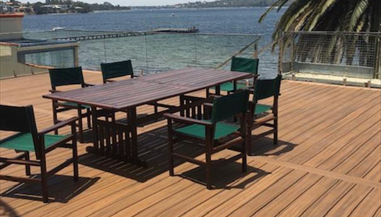 Above a water free garage using Trex Rain Escape and Havana Gold