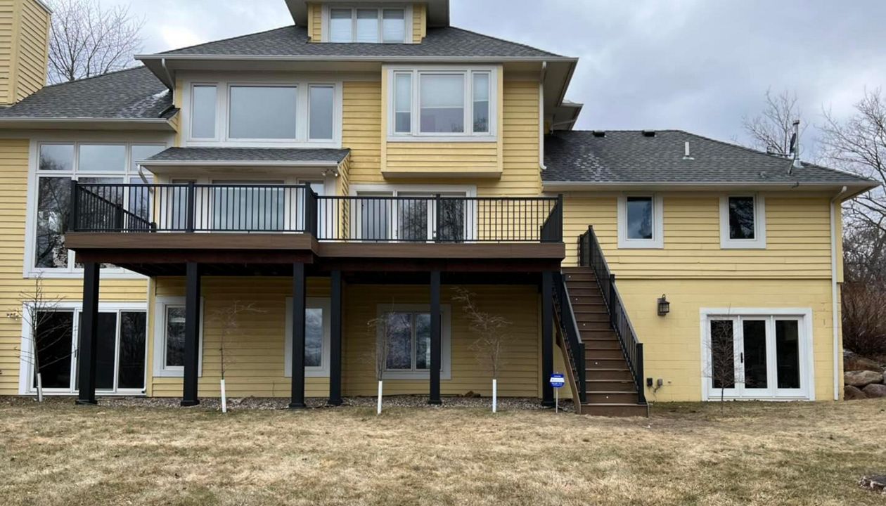 Trex Transcend Tropical Decking with Black, Alum Railing Built by Total Contracting & Improvement, LLC in Mound, MN