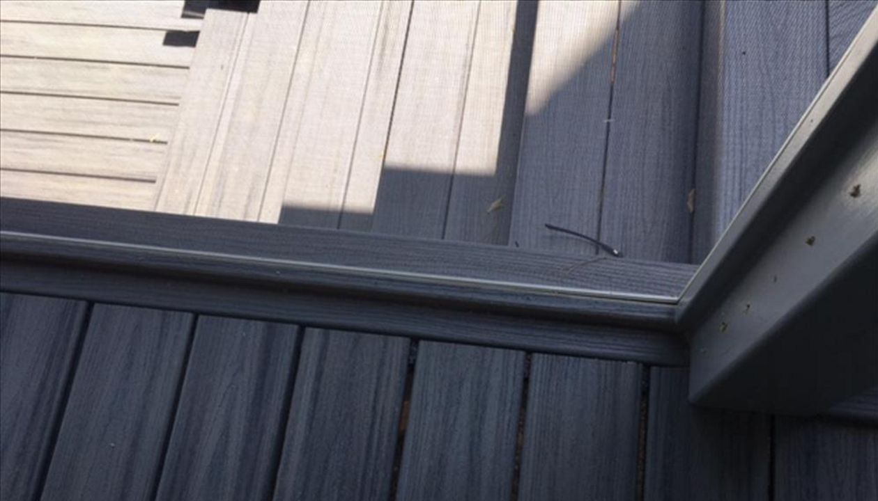 Trex Transcend breaker board is a great transition between screened porch and deck