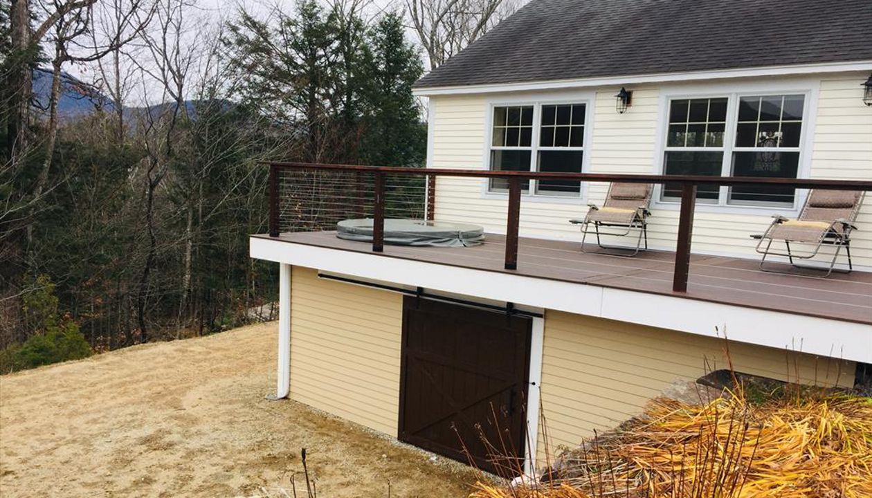 This deck has three hundred square feet of the rain escape system. This gave my customer a shed are under the deck for storage that other wise would be wasted space .