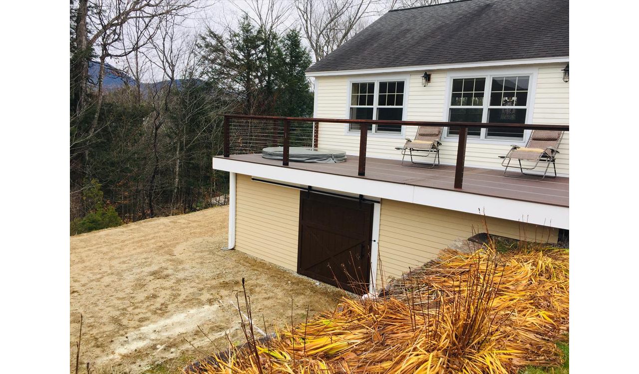 This deck has three hundred square feet of the rain escape system. This gave my customer a shed are under the deck for storage that other wise would be wasted space .