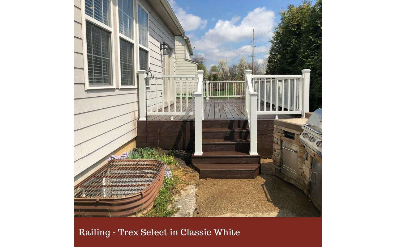 Trex Deck in Saddle. Trex Select Railing - Classic White.