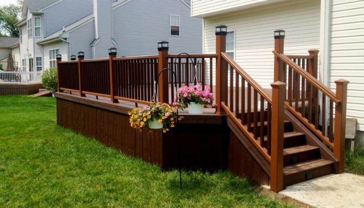 Lava Rock decking with vintage lantern boarder/skirting