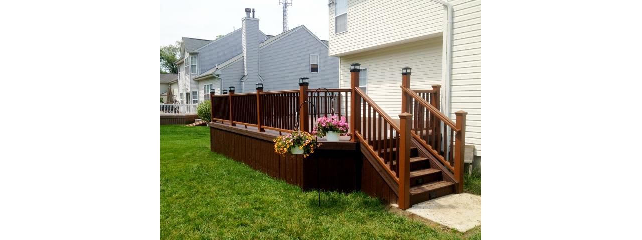 Lava Rock decking with vintage lantern boarder/skirting