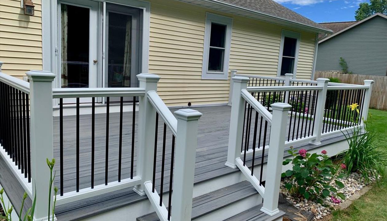 Trex Transcend railing and Island Mist decking.  Custom deck builder in Spring Lake, MI.