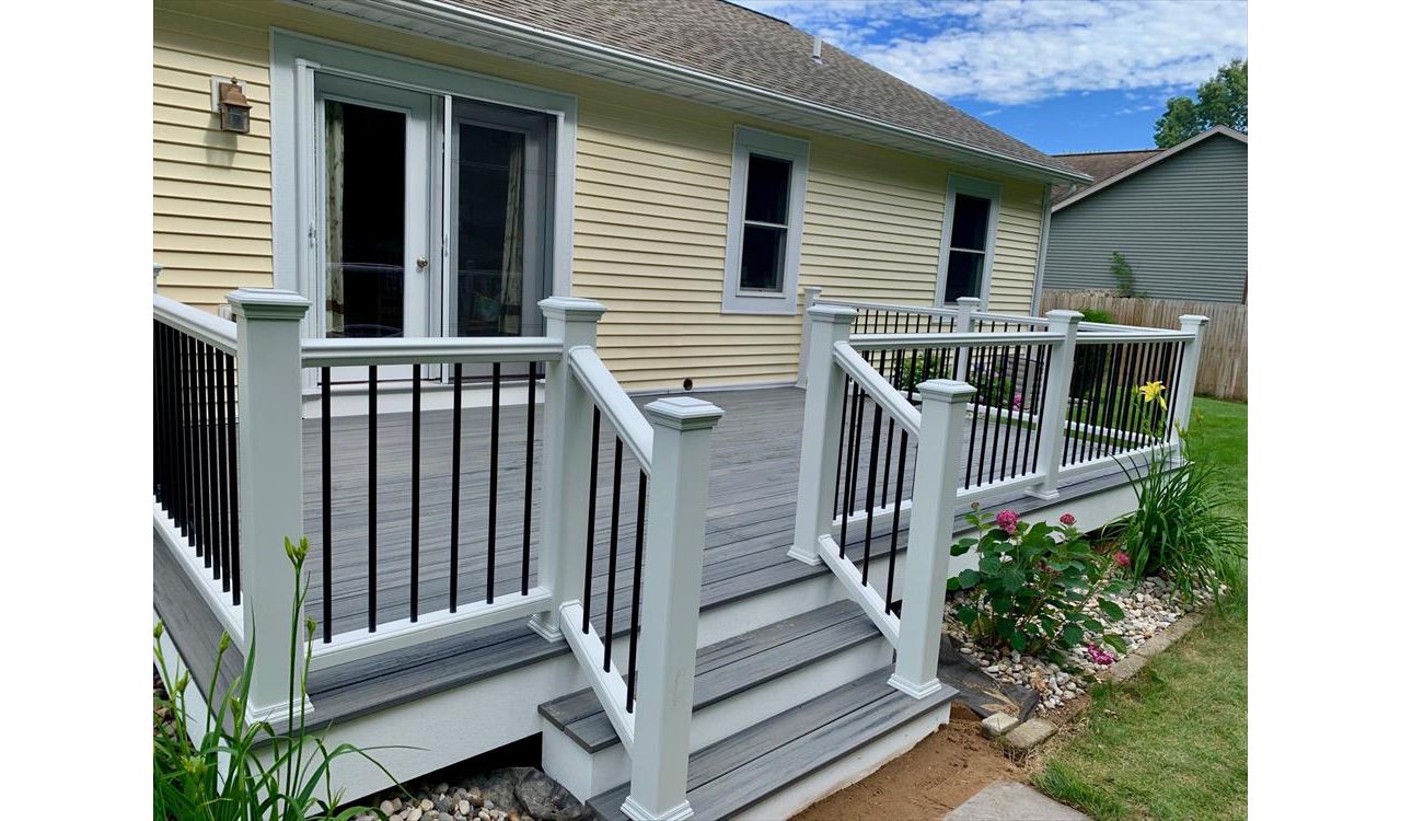 Trex Transcend railing and Island Mist decking.  Custom deck builder in Spring Lake, MI.