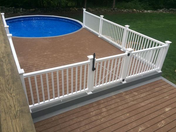 select saddle decking with pebble grey border, fascia and risers. vinyl rail