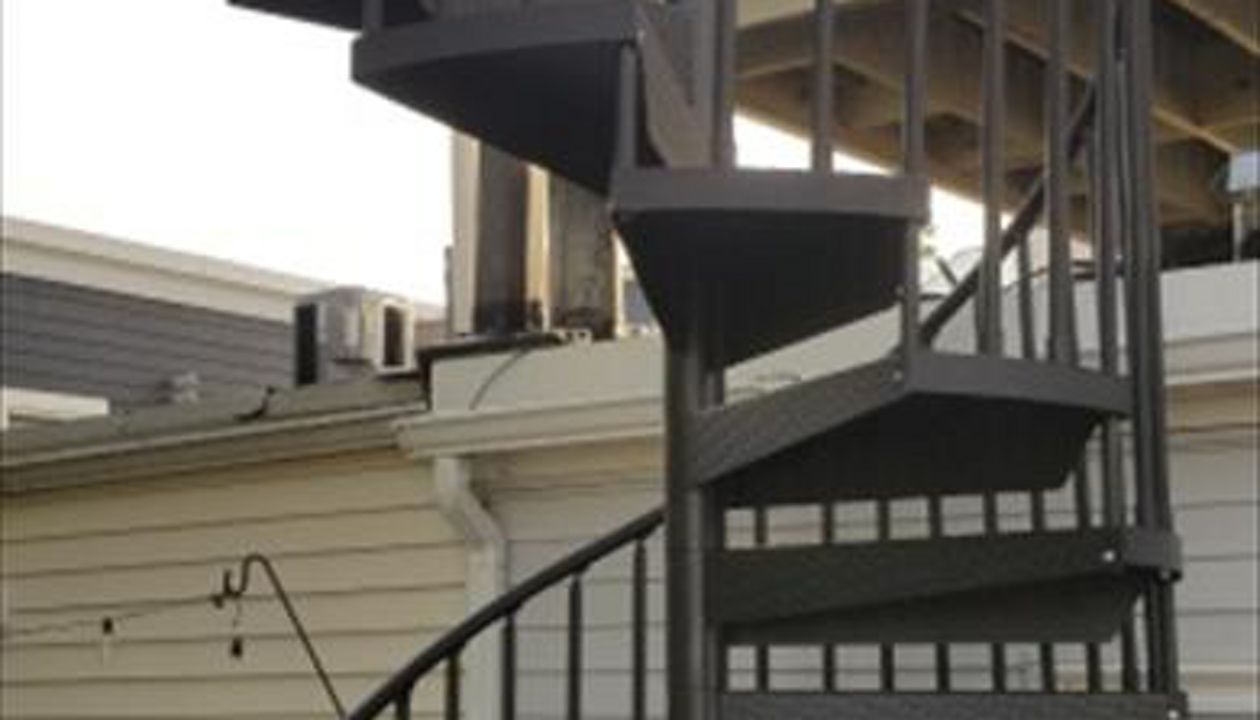 Spiral stairway to Trex Roof Deck