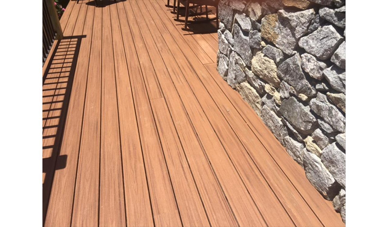 Trex Tiki Torch color looks great with stone siding