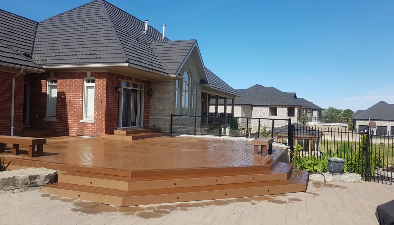 Main: Trex Enhance Basics in Beach Dune. Trim: Trex Enhance Basics in Saddle. Contact Align Decking today for your custom composite decking needs. Servicing Durham Region, Kawartha Lakes, and the Barrie & Orillia areas.