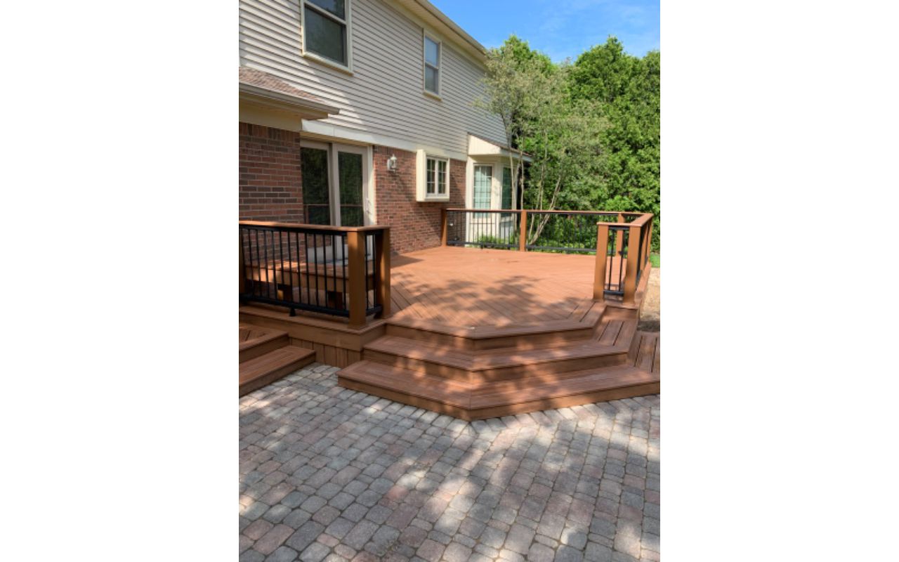 Trex Tiki Torch decking.  Tree house post sleeve, Black transcend railing.  tiki torch cocktail rail, plymouth michigan,  wright way contractors